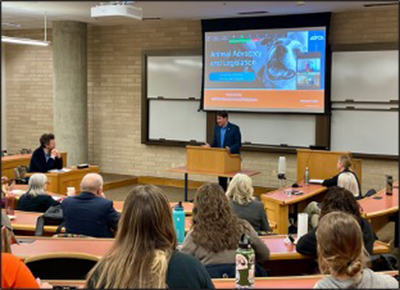 presenter speaking to students in law classroom